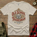Cream t-shirt with "Old School Tradesman Built on Experience Est. 1928" text and anvil graphic.
