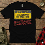 Black t-shirt with yellow "Caution Tradesman On Vacation" and red "Actual Relaxation Results May Vary" text.
