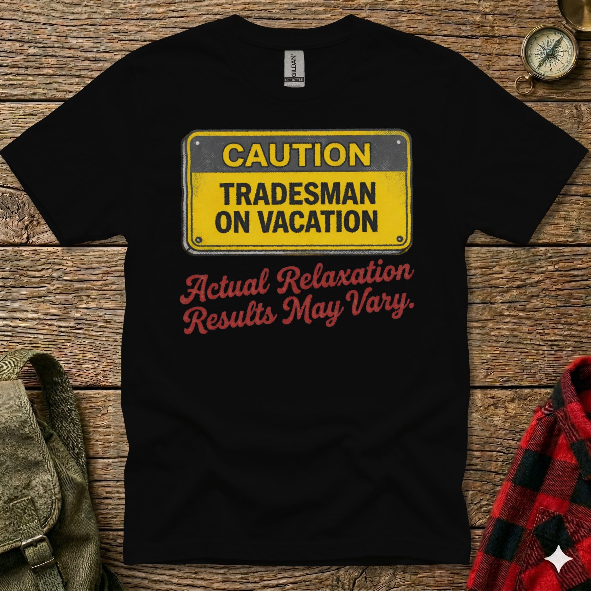 Black t-shirt with yellow "Caution Tradesman On Vacation" and red "Actual Relaxation Results May Vary" text.