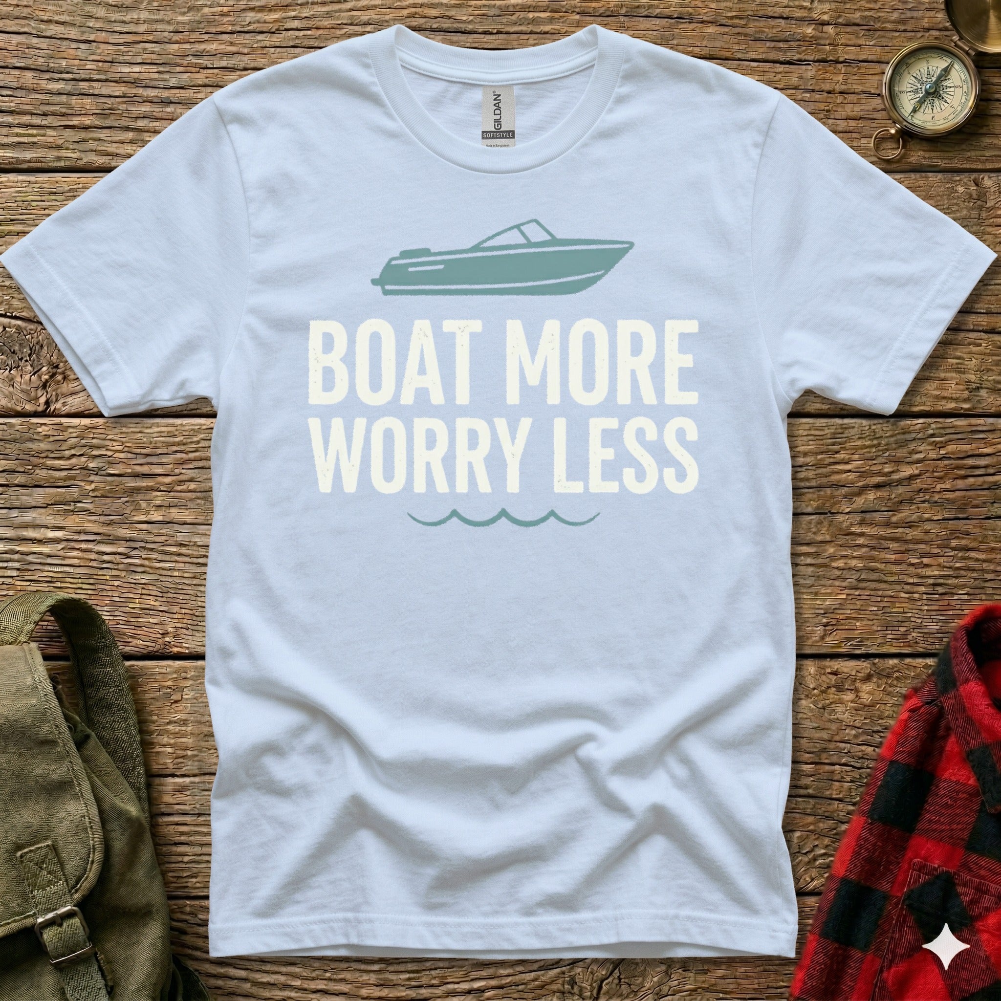 Light blue t-shirt with "BOAT MORE WORRY LESS" in light gray text.
