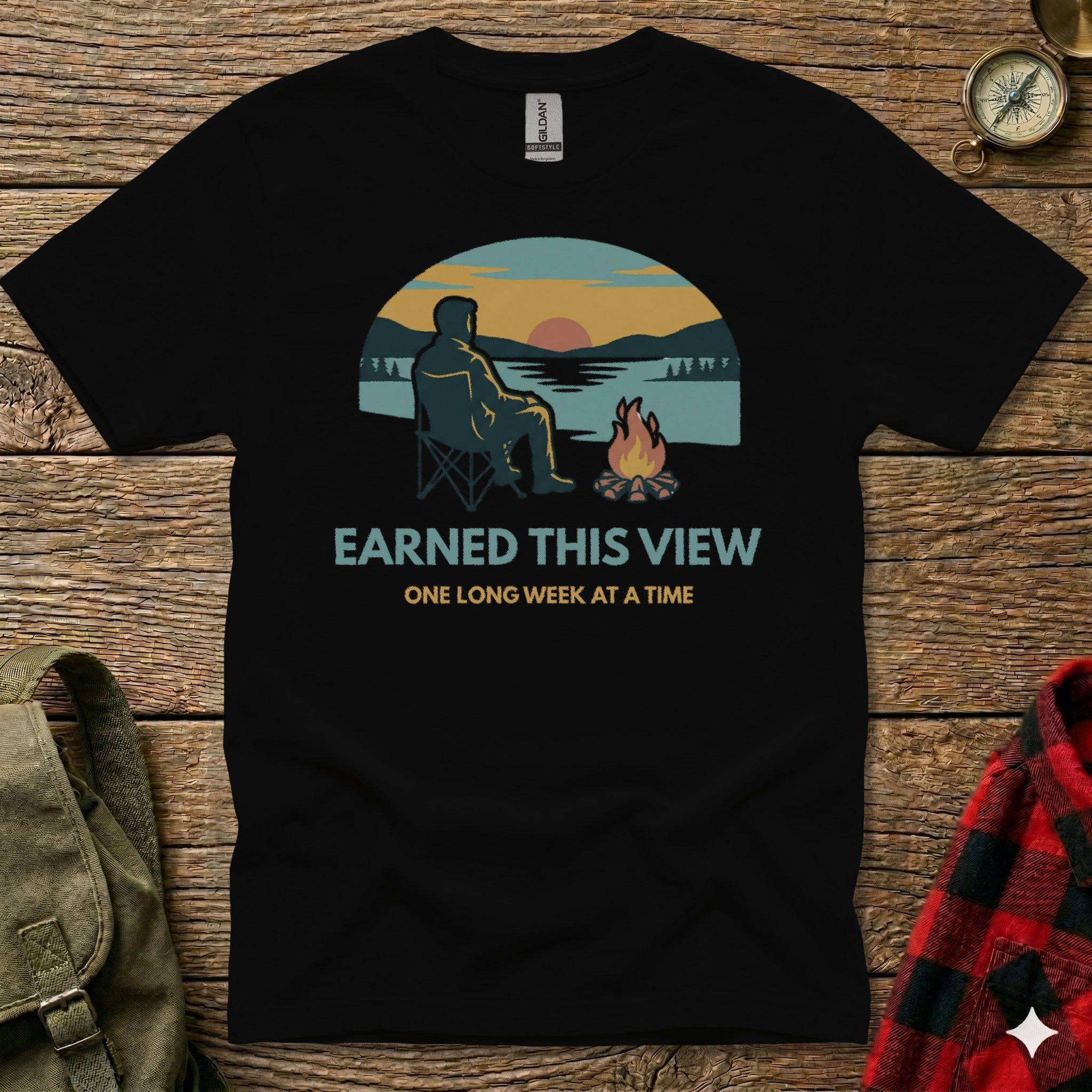 Black t-shirt with "Earned This View" and campfire scene.