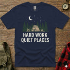 Navy t-shirt with "Hard Work Quiet Places" and a cabin in the woods graphic.