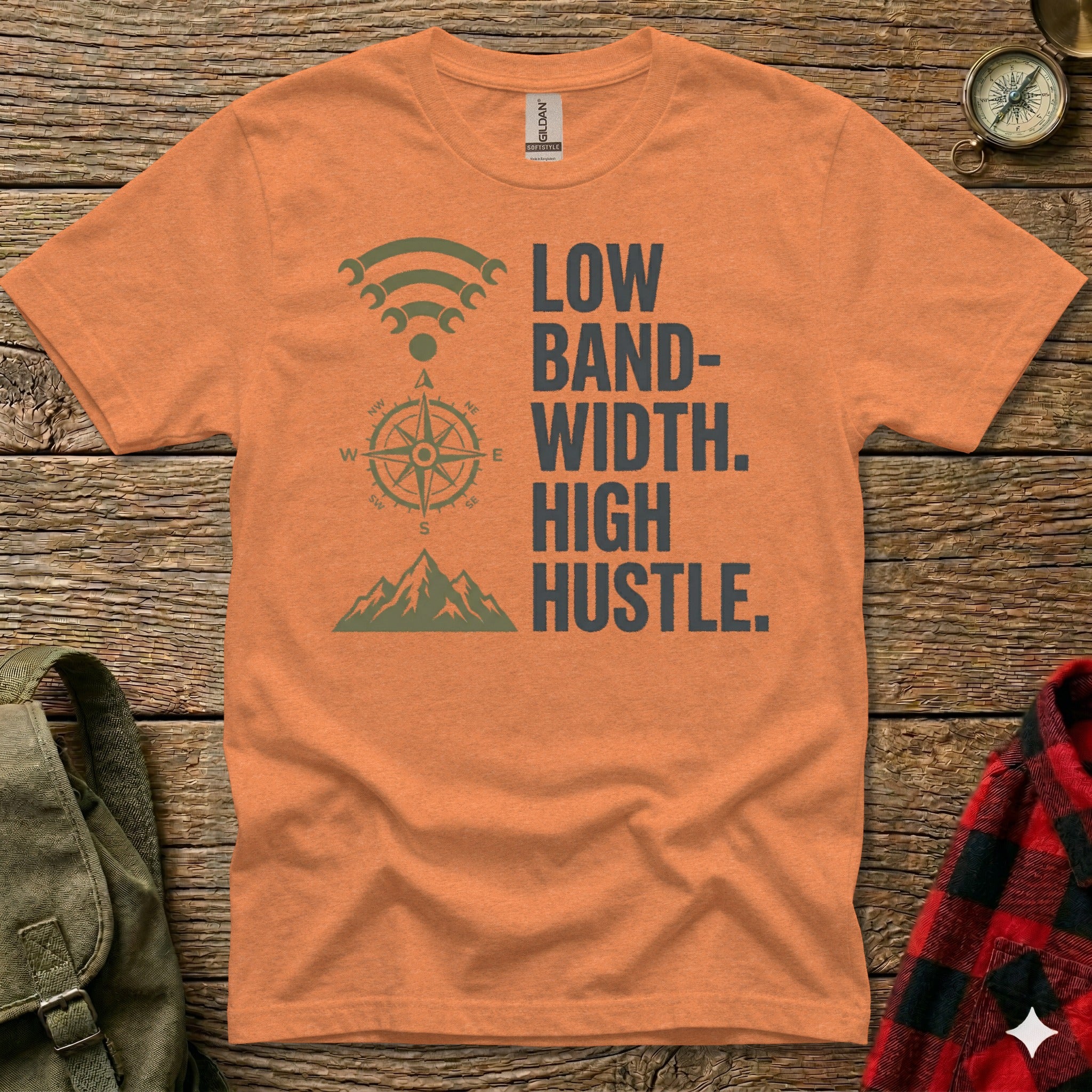 Orange t-shirt with "LOW BAND-WIDTH. HIGH HUSTLE." text and compass graphic.