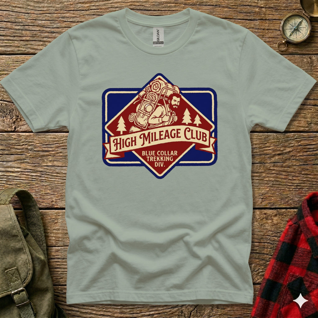 Gray t-shirt with "High Mileage Club" badge logo featuring a hiker carrying a large pack.