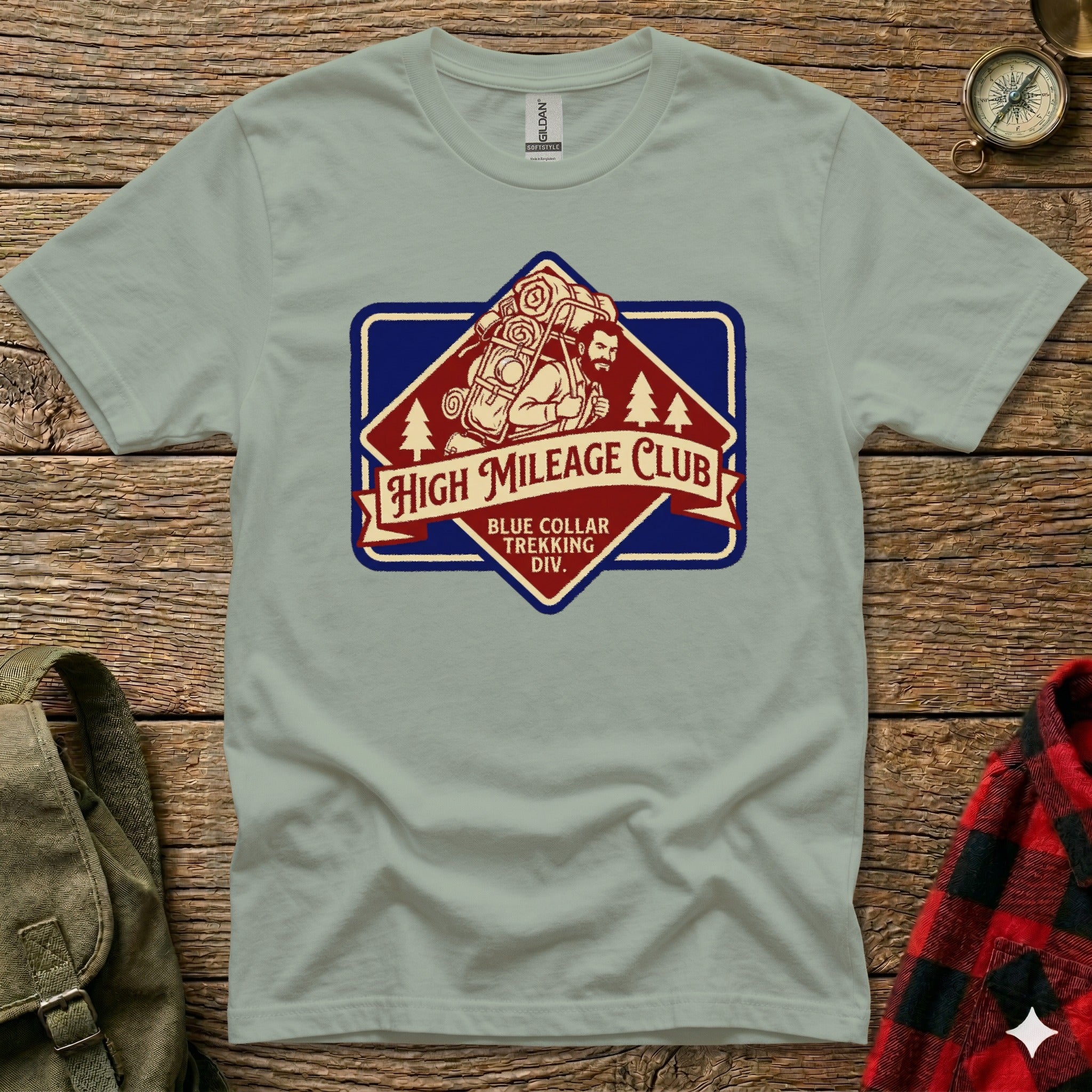 Gray t-shirt with "High Mileage Club" badge logo featuring a hiker carrying a large pack.