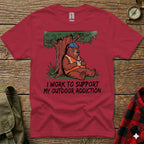 Red t-shirt with a bear in a hard hat and vest drinking coffee under a tree.