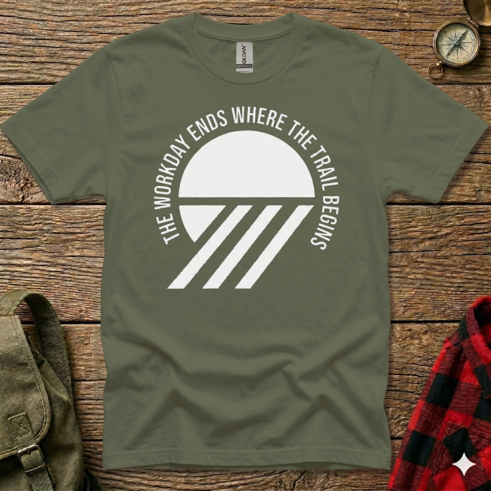 Olive t-shirt with "The Workday Ends Where the Trail Begins" text and graphic.