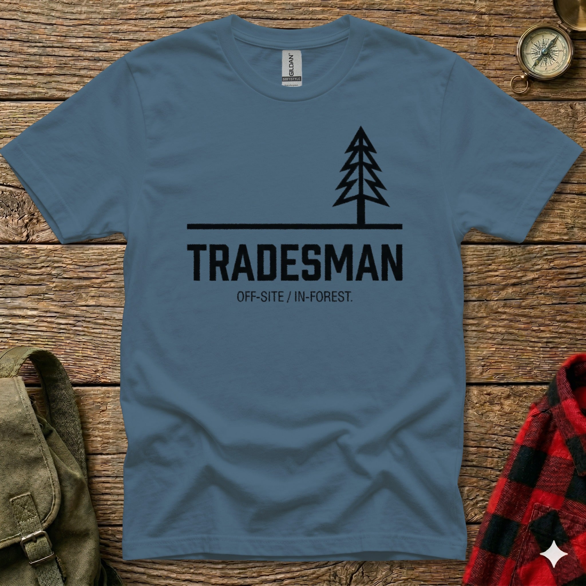 Blue t-shirt with "TRADESMAN OFF-SITE/IN-FOREST" and a tree logo.
