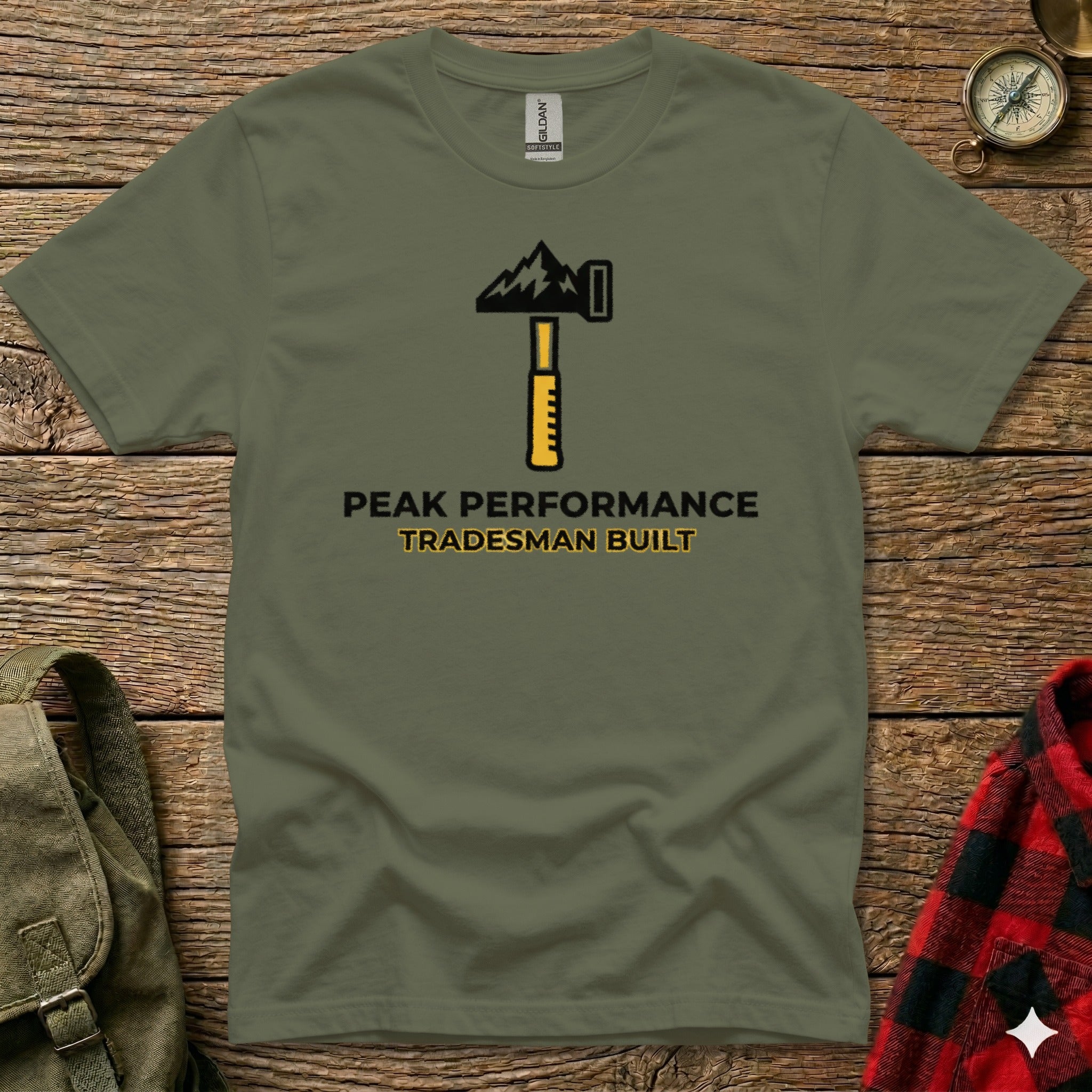 Green t-shirt with "PEAK PERFORMANCE TRADESMEN BUILT" text and hammer graphic.