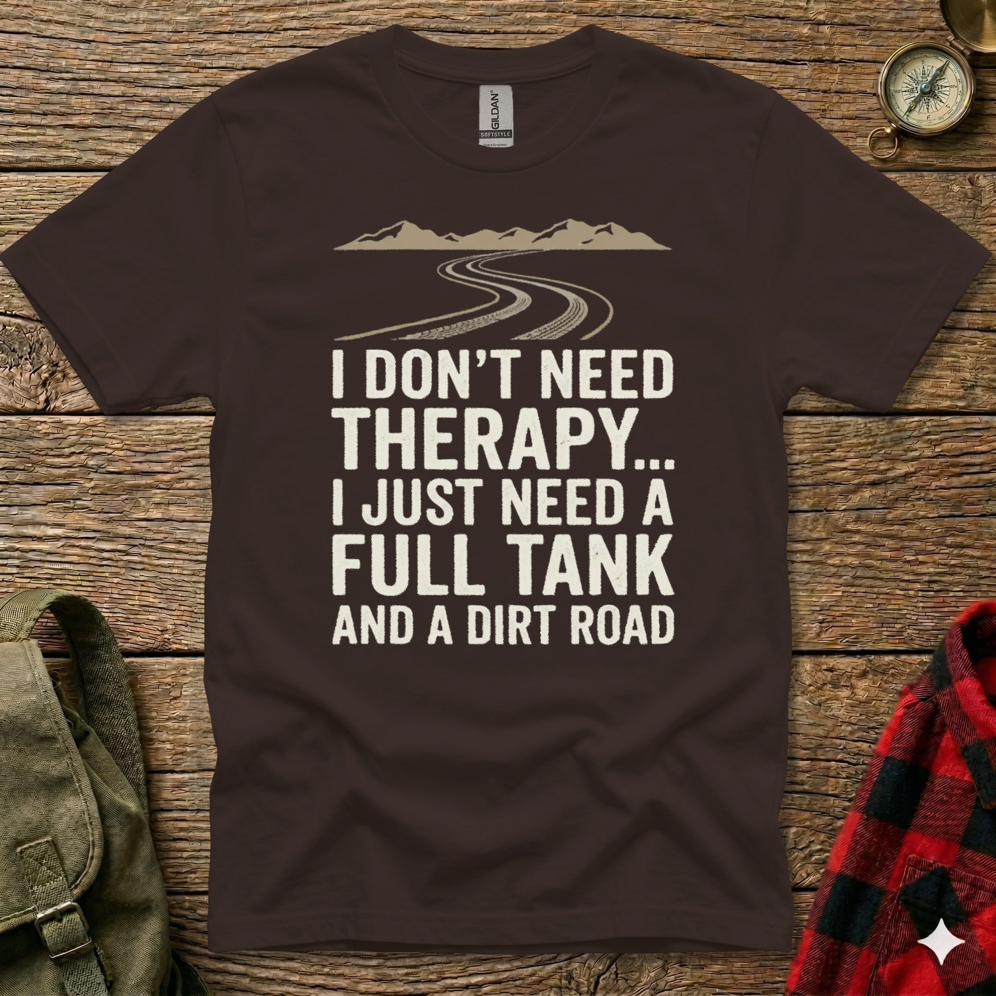 Brown t-shirt with text "I DON'T NEED THERAPY... I JUST NEED A FULL TANK AND A DIRT ROAD".