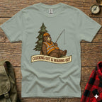 T-shirt featuring a cartoon bear in a hard hat and vest fishing next to a tree.
