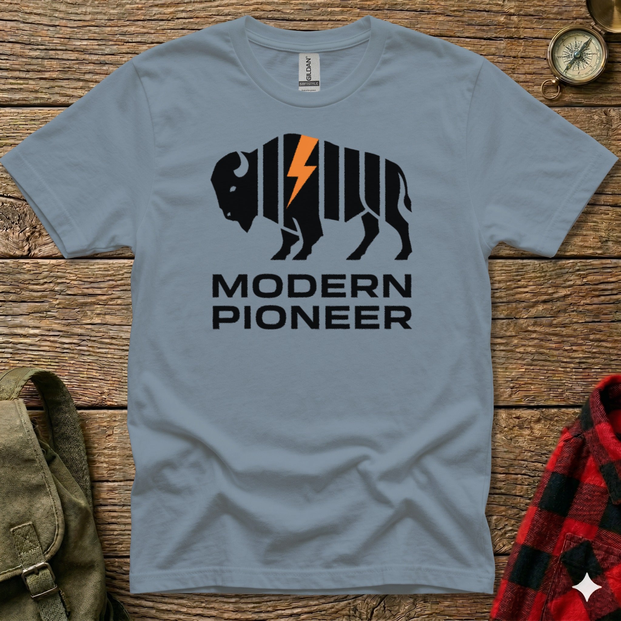 Gray t-shirt with a black bison silhouette superimposed with orange lightning bolt graphic and "MODERN PIONEER" text.