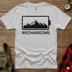 White t-shirt with "Recharging" text and mountain battery icon.