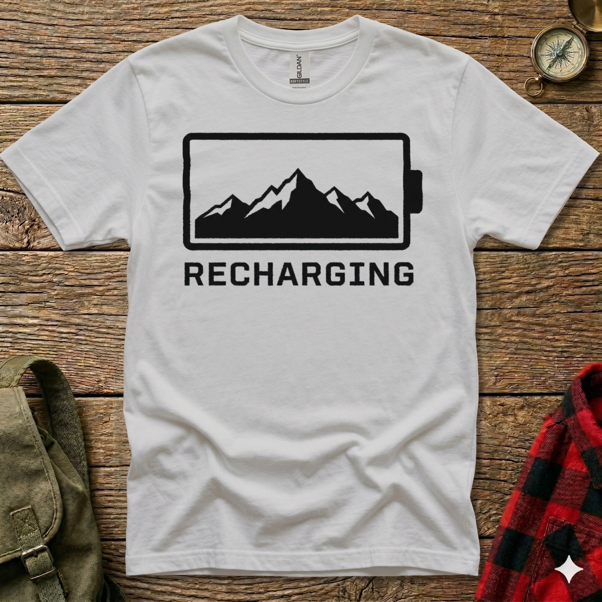 White t-shirt with "Recharging" text and mountain battery icon.