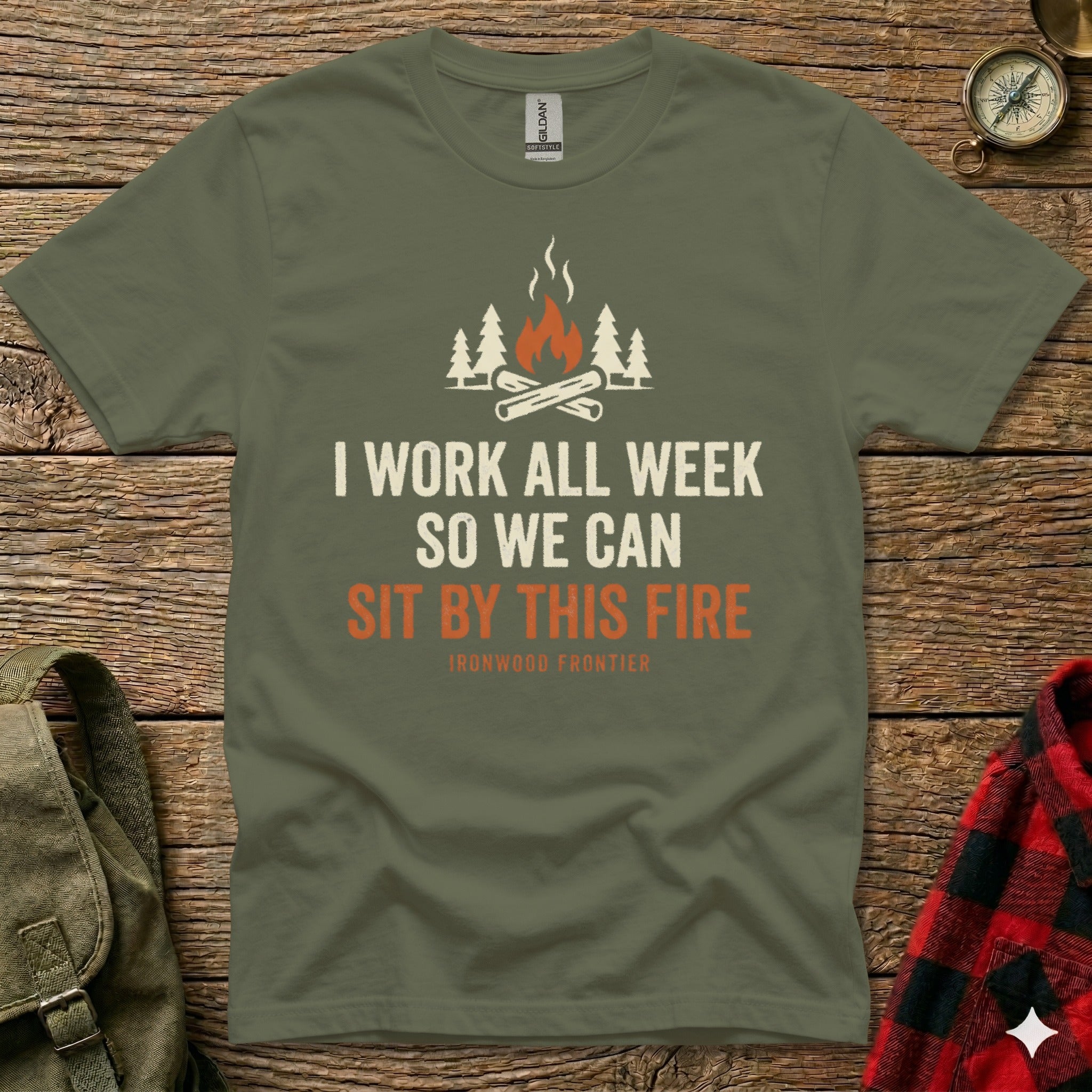 Olive green t-shirt with "SIT BY THIS FIRE" and trees/fire graphic.