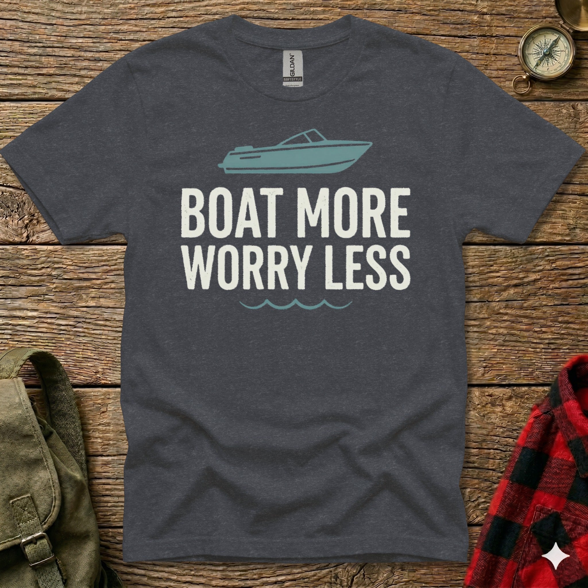 Dark t-shirt with "Boat More Worry Less" and wave graphic.