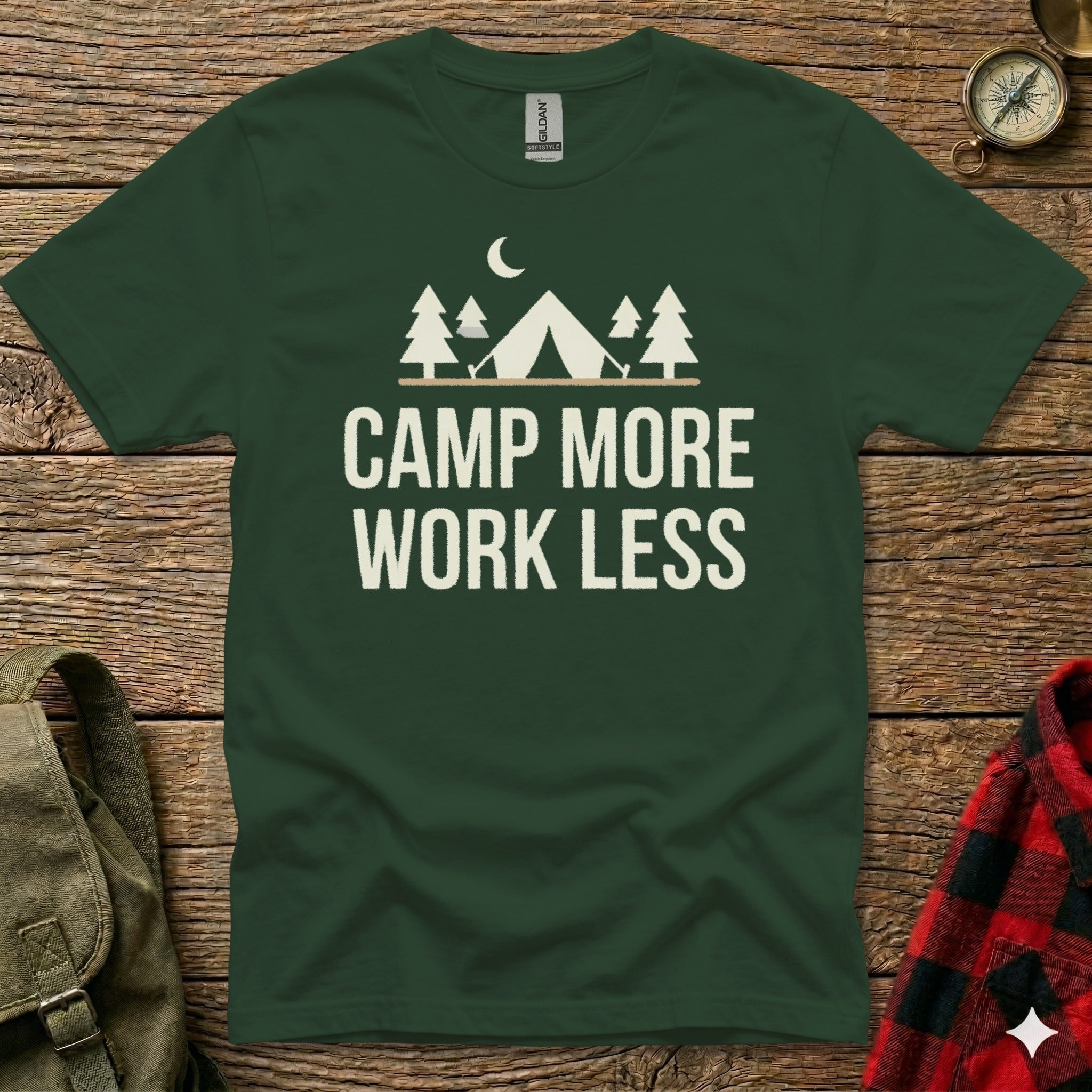 Green t-shirt with "Camp More Work Less" text and camping graphic.