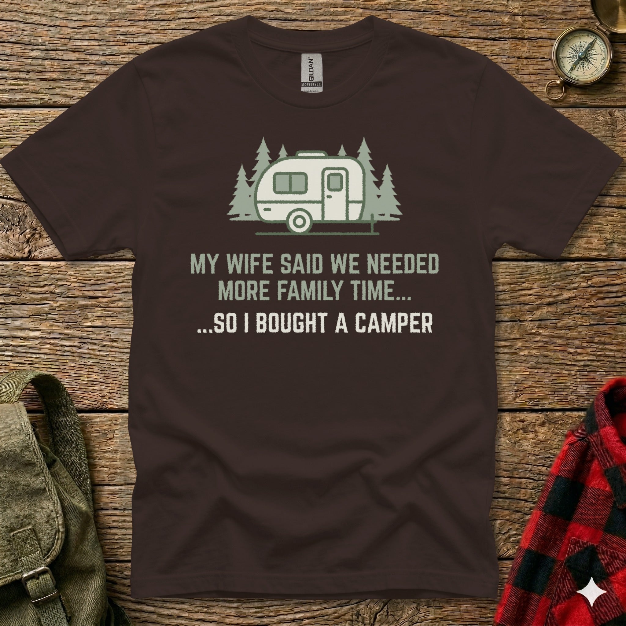 Brown t-shirt with camper illustration and text about buying a camper.