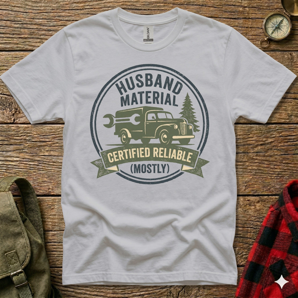 White t-shirt with "Husband Material Certified Reliable (Mostly)" text and graphic.