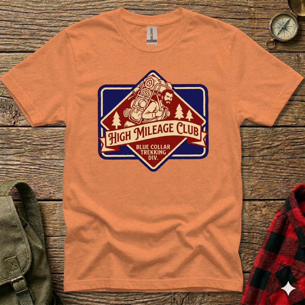 Orange t-shirt featuring "High Mileage Club" logo with hiker and backpack.