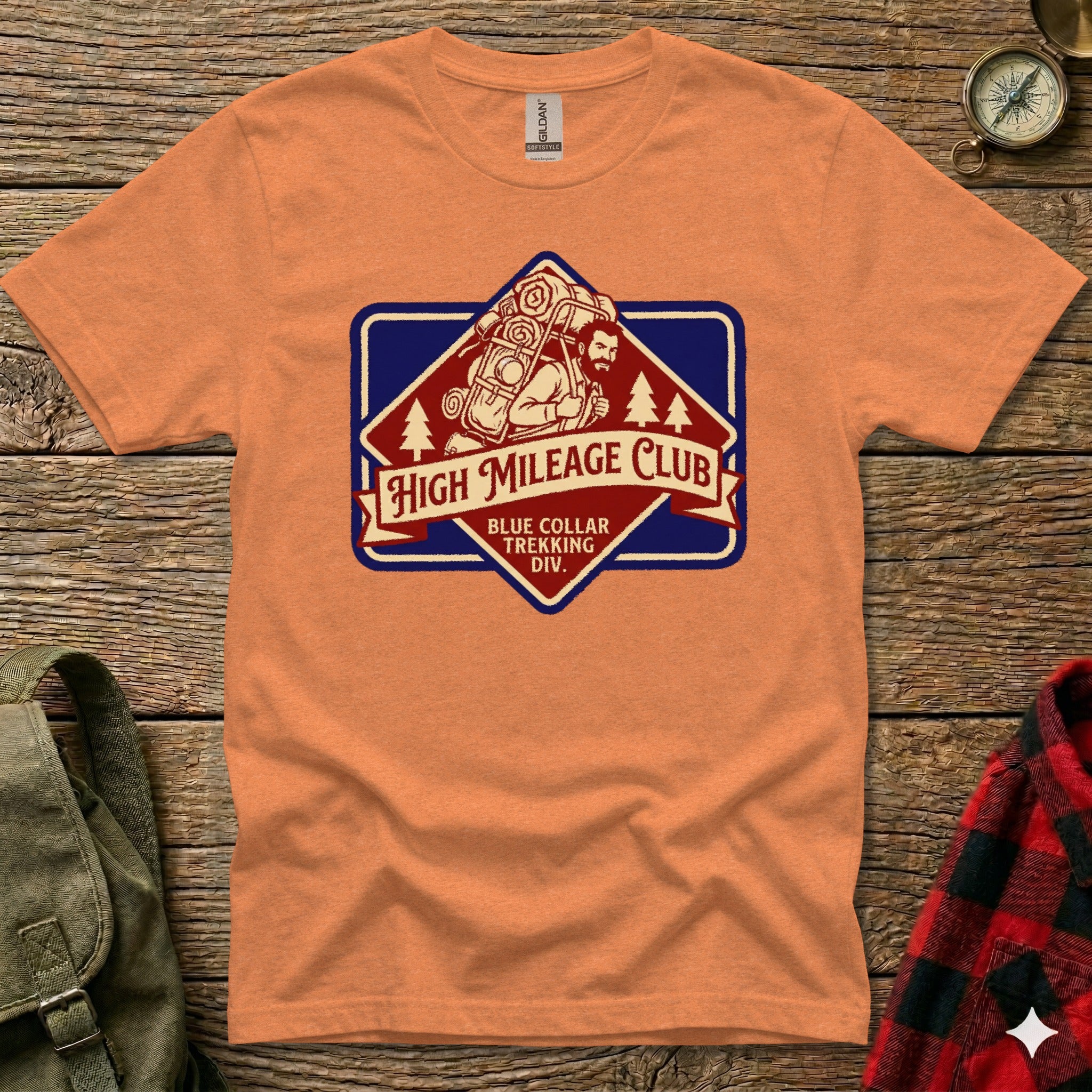 Orange t-shirt featuring "High Mileage Club" logo with hiker and backpack.