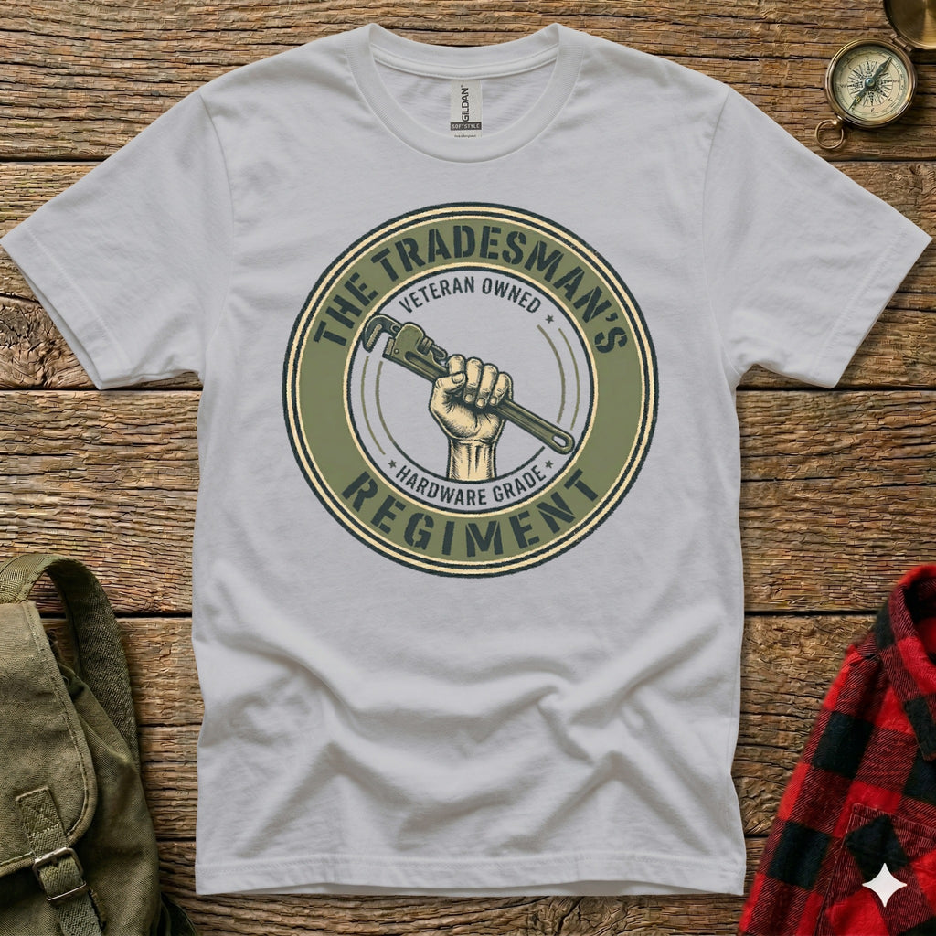 Tradesman's Regiment veteran owned hardware grade logo on a light grey t-shirt.