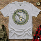 Tradesman's Regiment veteran owned hardware grade logo on a light grey t-shirt.