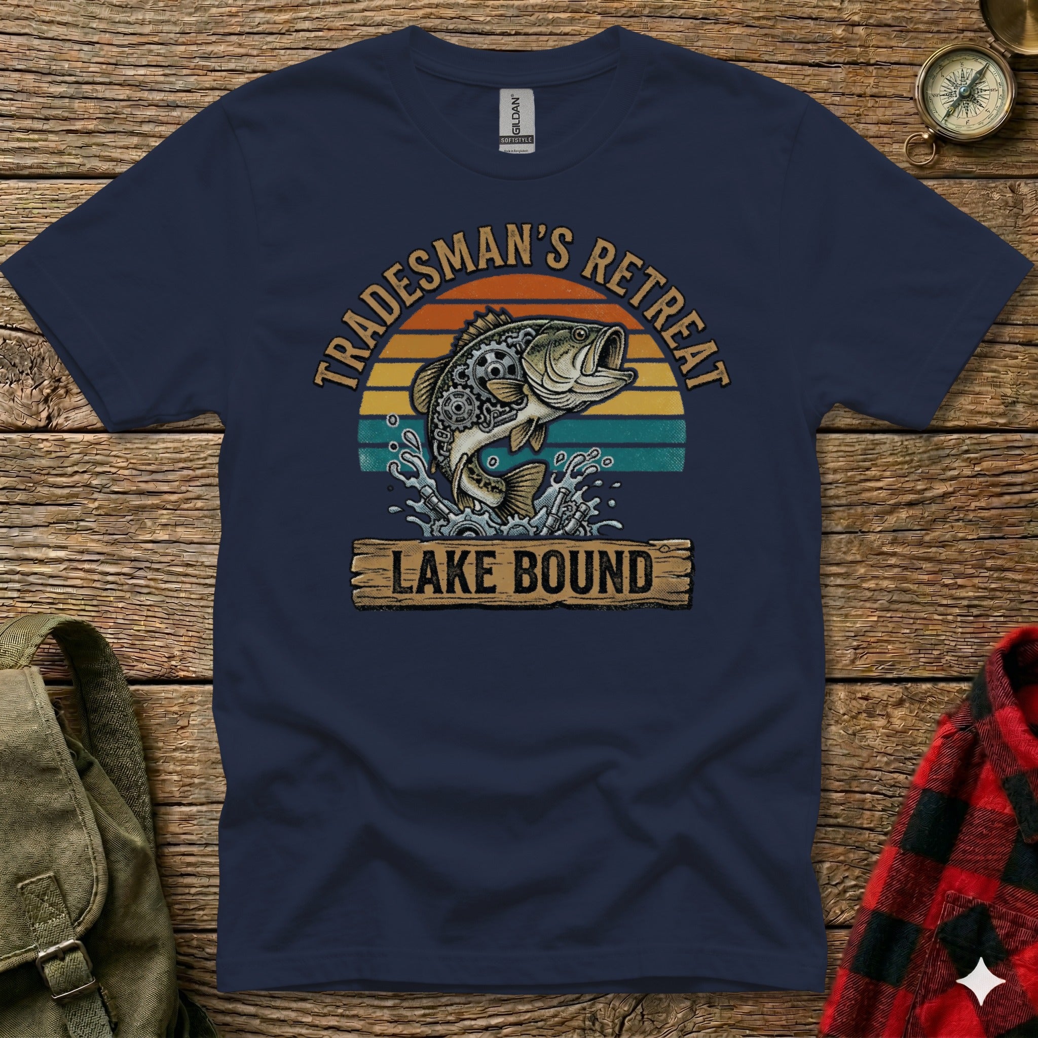 Navy t-shirt with "Tradesman's Retreat Lake Bound" and a jumping bass design.