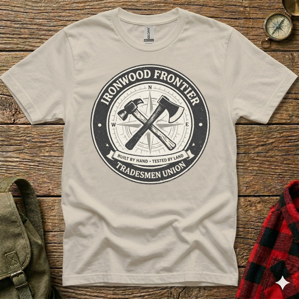 Cream t-shirt with "Ironwood Frontier Tradesmen Union" circular logo and crossed hammer and axe.