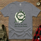 Gray t-shirt with compass graphic and text "Built for the Shift, Born for the Frontier."