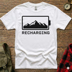 White t-shirt with "Recharging" text and a mountain range inside a battery icon.