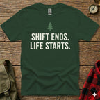 Dark green t-shirt with white text "SHIFT ENDS. LIFE STARTS." and a small tree icon.