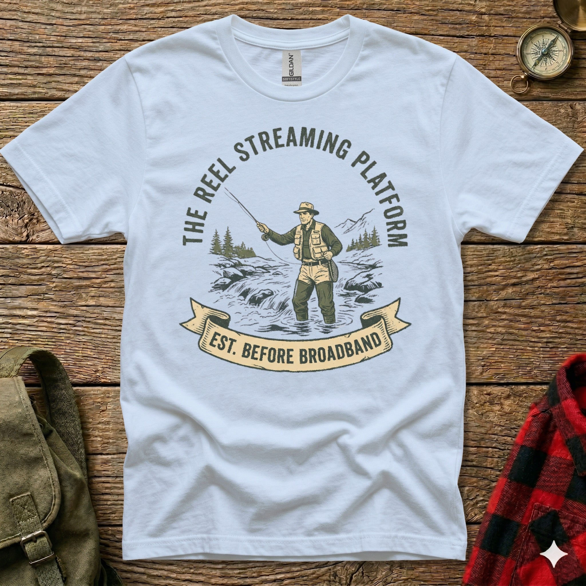 T-shirt graphic of fisherman with text "The Reel Streaming Platform. Est. Before Broadband."