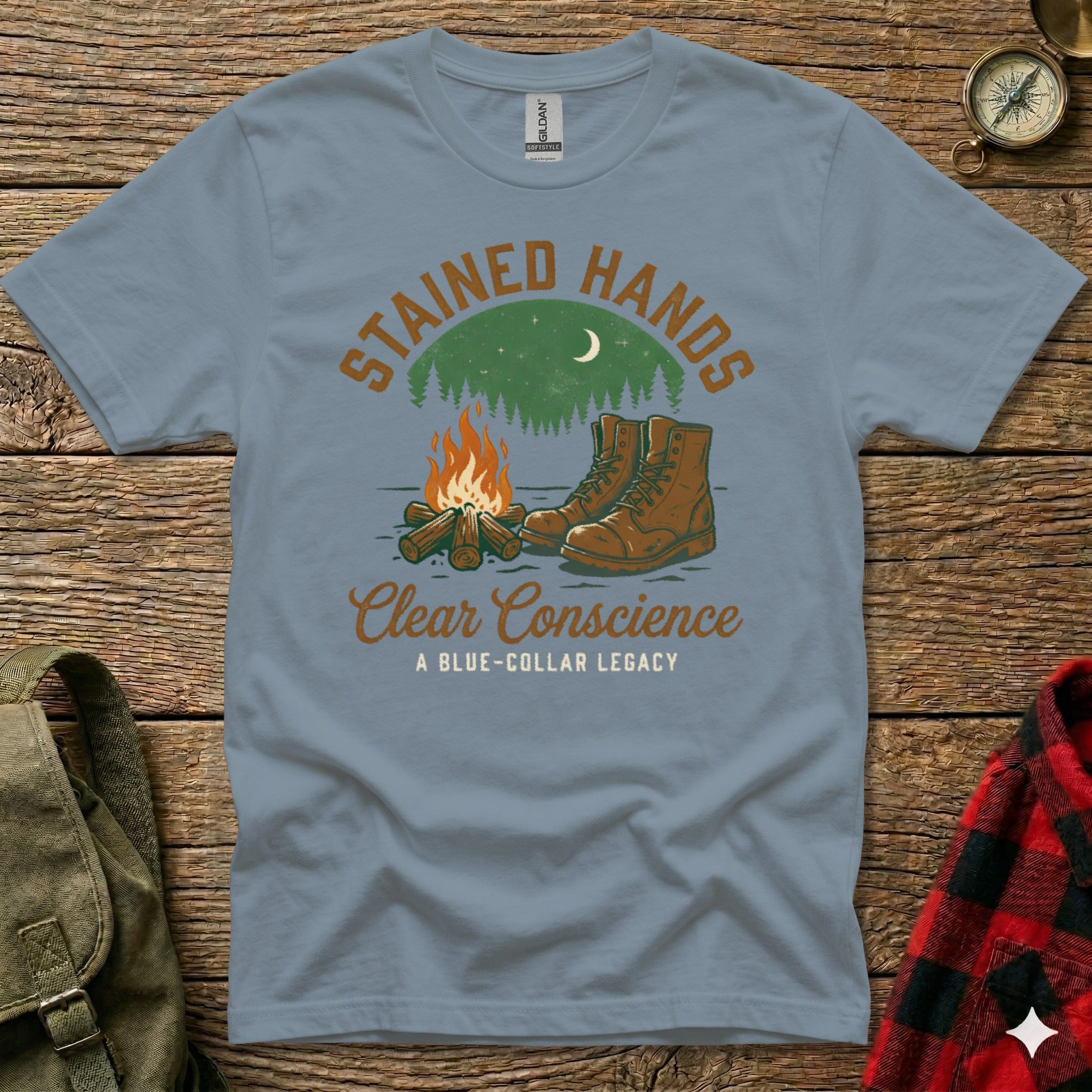 T-shirt with campfire, hiking boots, and "Stained Hands Clear Conscience" text.