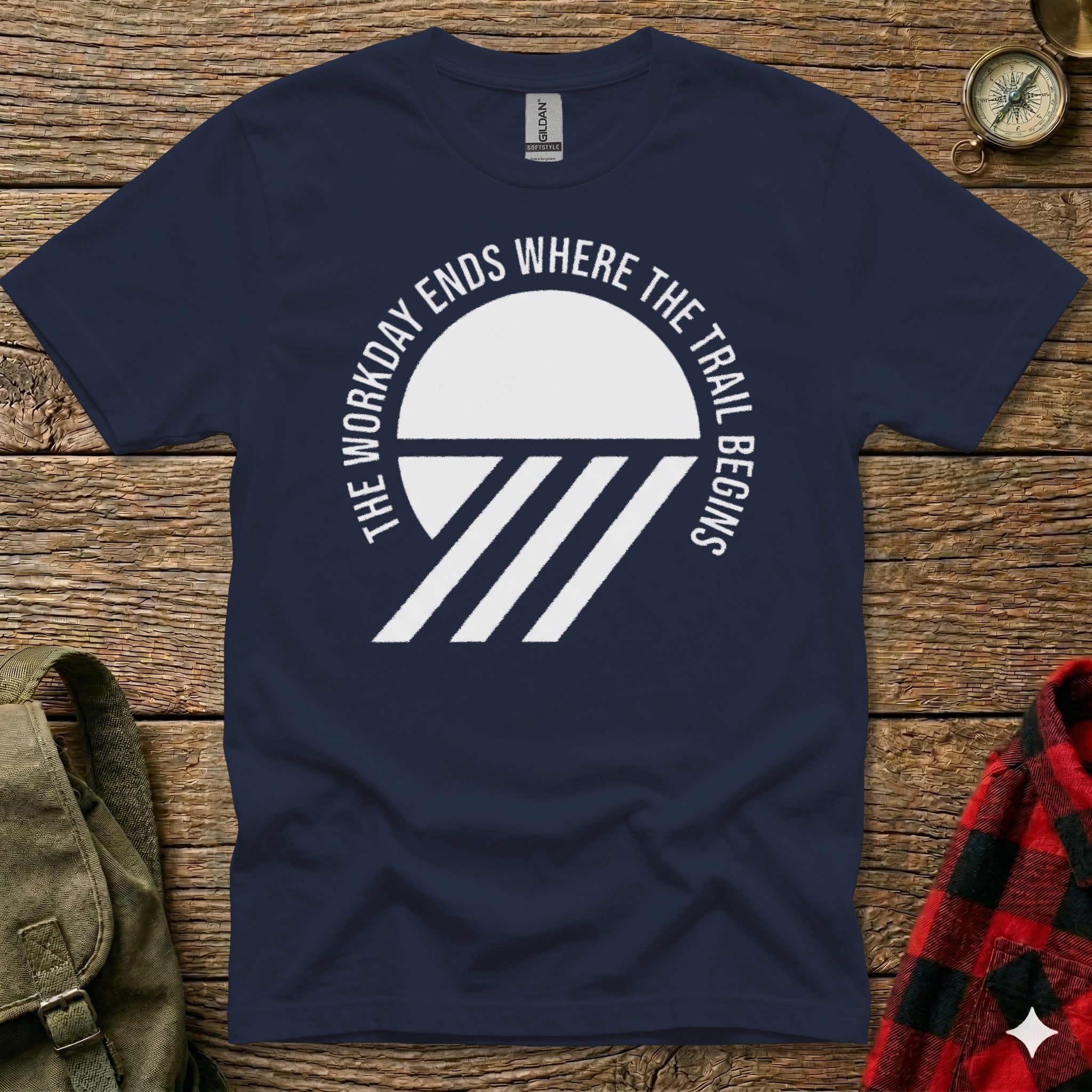 Navy t-shirt with white text and graphic: "The workday ends where the trail begins."