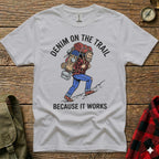 T-shirt with graphic of hiker and text "DENIM ON THE TRAIL BECAUSE IT WORKS".