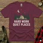 Maroon t-shirt with "HARD WORK QUIET PLACES" text and forest scene graphic.