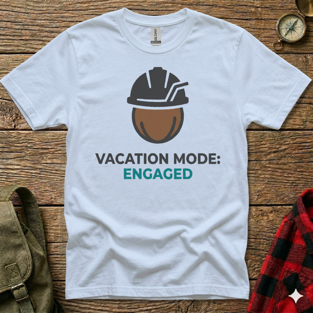 White t-shirt with "Vacation Mode: ENGAGED" graphic featuring a hard hat and drink.