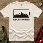White t-shirt with "RECHARGING" text above mountain silhouette in battery icon.