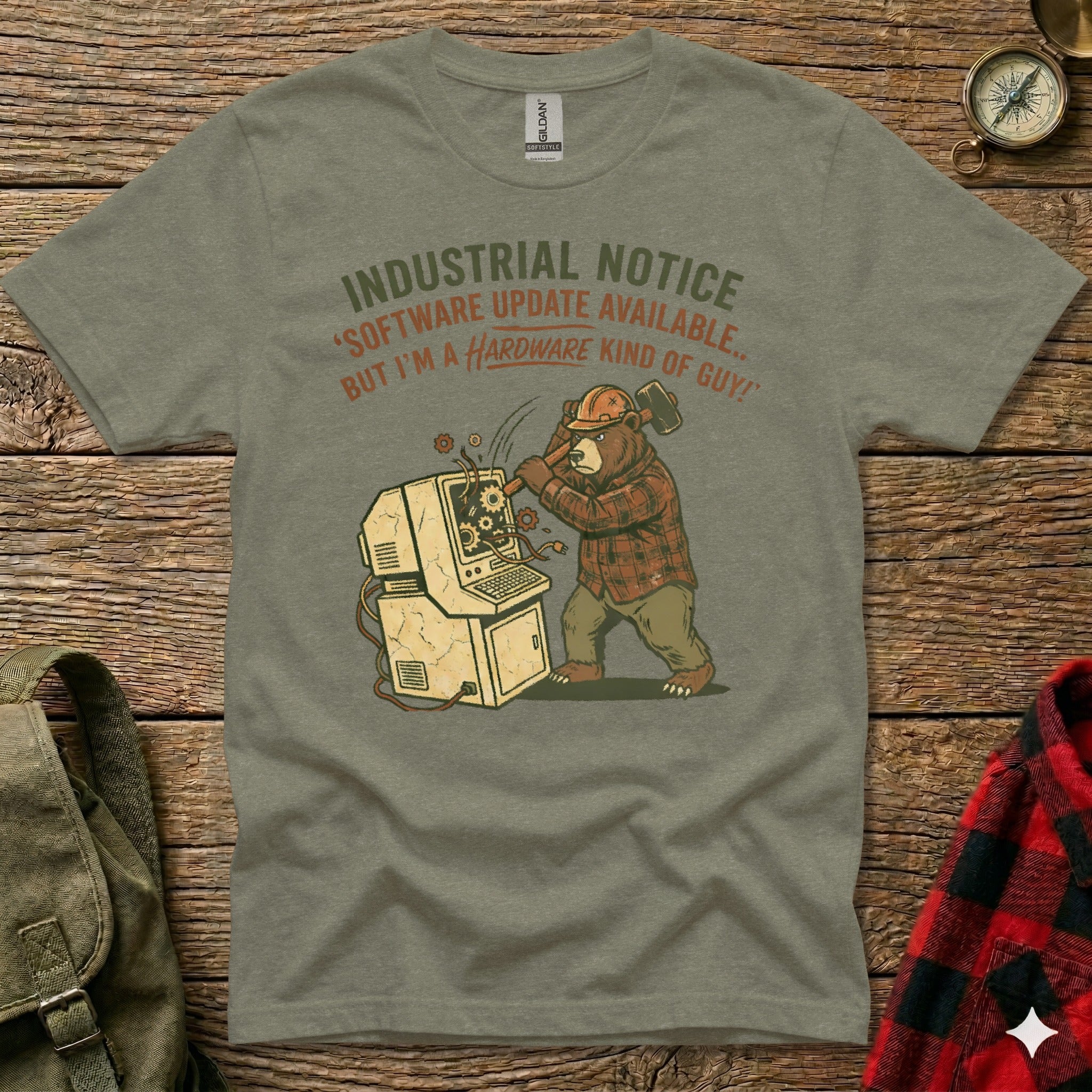 T-shirt with bear wearing hard hat, smashing computer; text reads "Industrial Notice: 'Software update available... But I'm a hardware kind of guy!'"