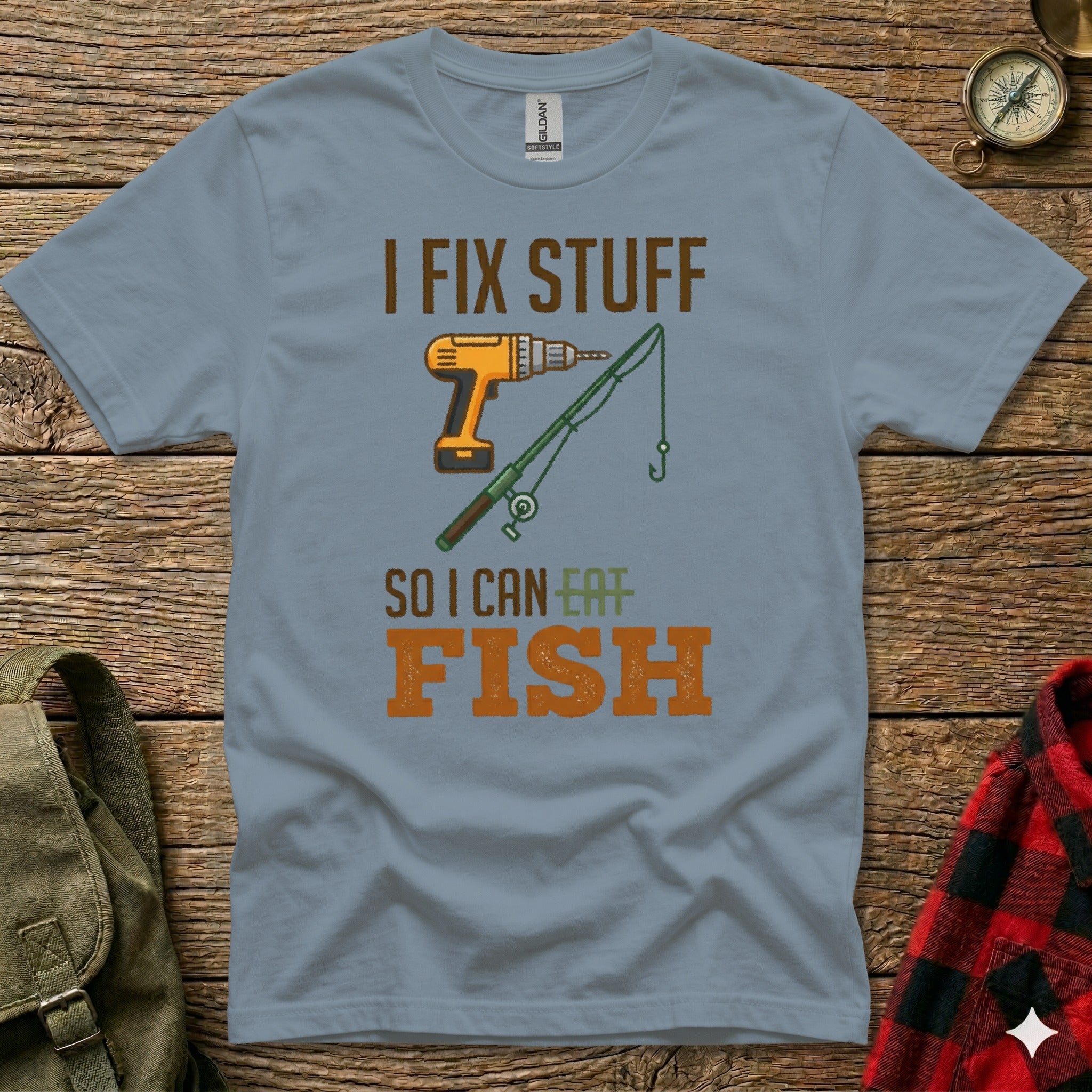 Gray t-shirt with drill, fishing rod, and text "I FIX STUFF SO I CAN EAT FISH".