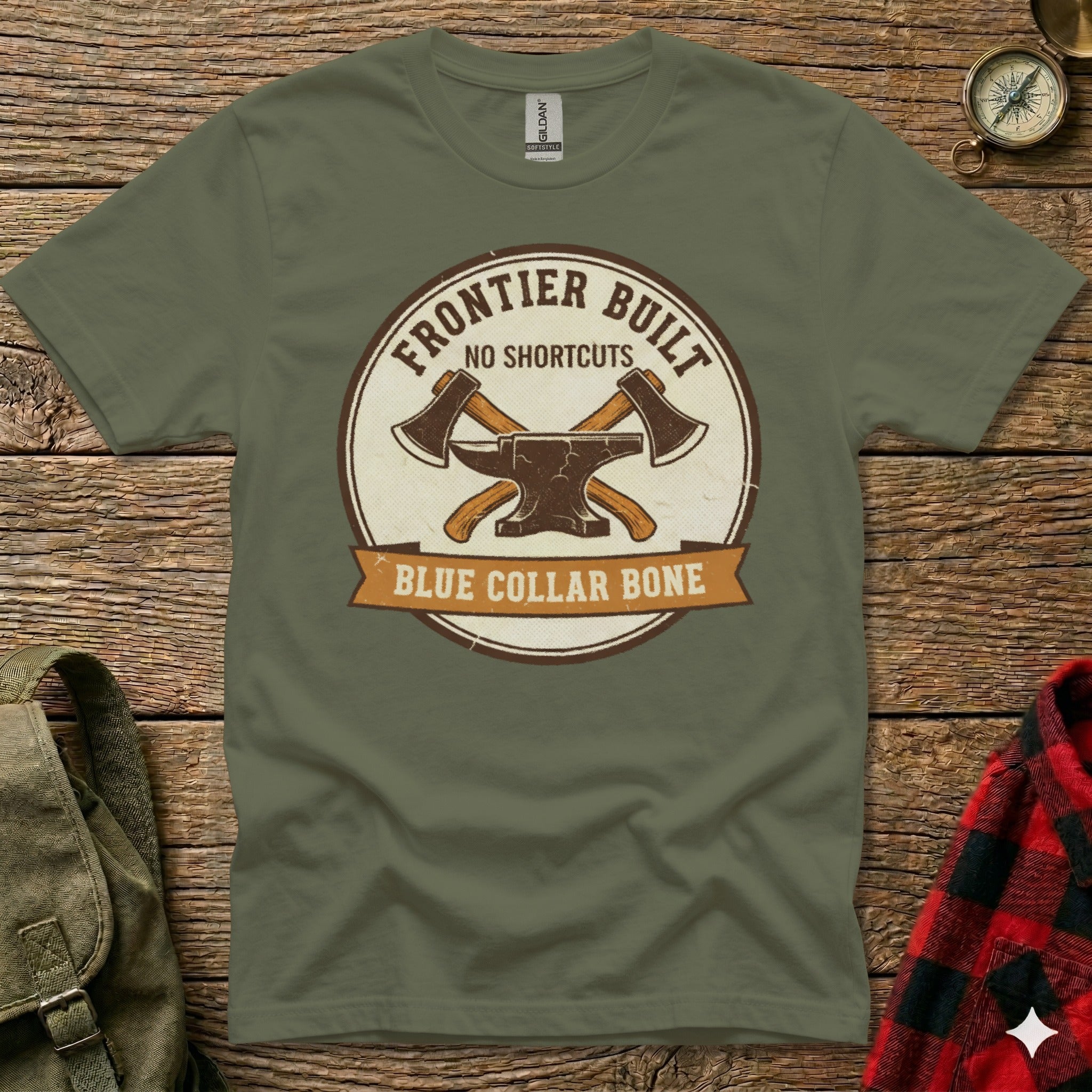 T-shirt with circular "Frontier Built" logo featuring crossed axes and "Blue Collar Bone" banner.