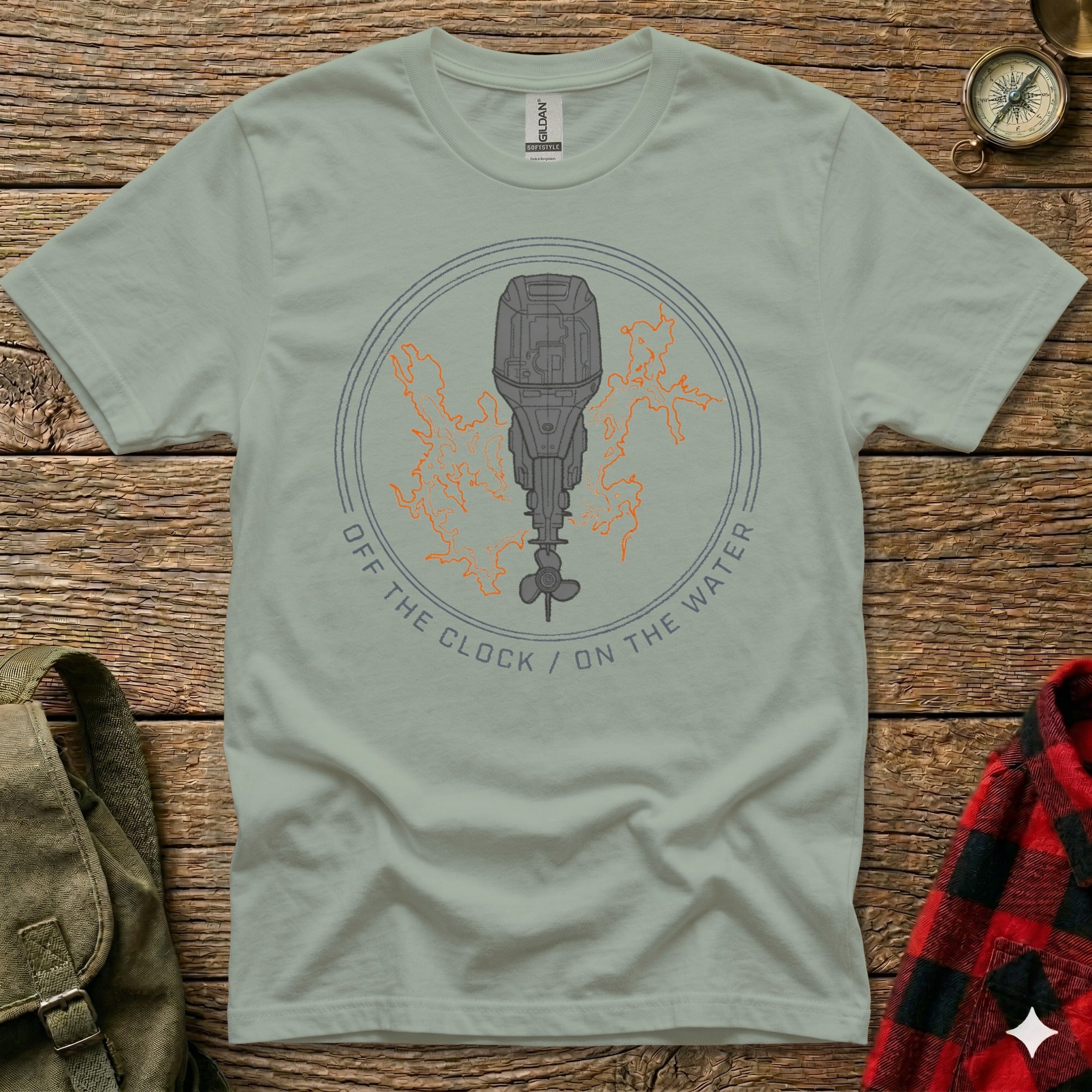 Light gray t-shirt with outboard motor graphic and text "Off the Clock / On the Water".
