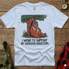 Bear in hard hat sips coffee under tree on white t-shirt with text.
