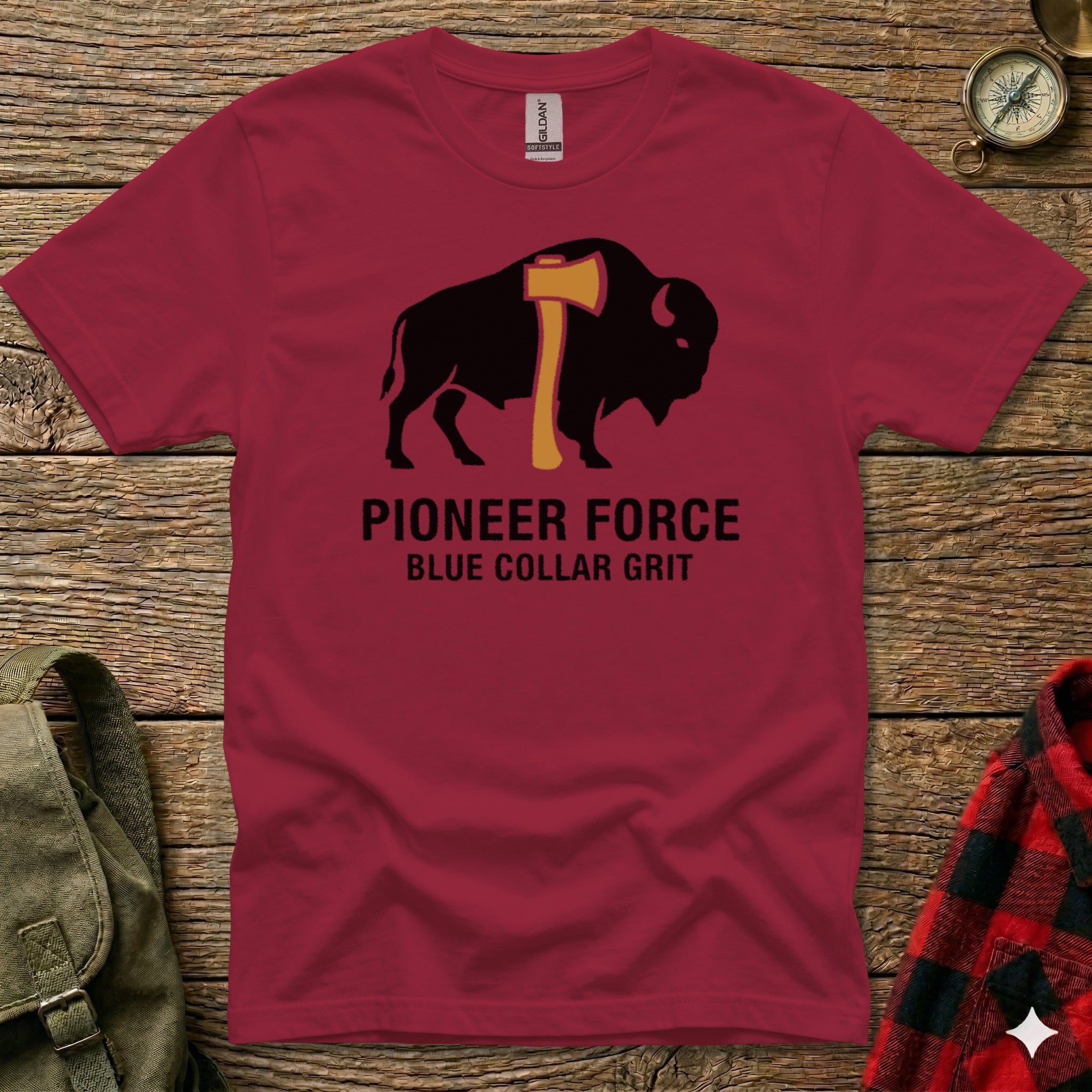 Maroon t-shirt with bison and axe graphic, "PIONEER FORCE" and "BLUE COLLAR GRIT" text.