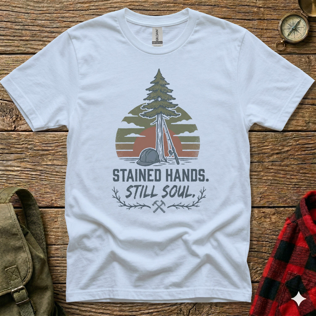 White t-shirt with "Stained Hands. Still Soul." text and tree graphic.