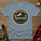 Ironwood Frontier vintage-style logo with mountains and gear on a grey t-shirt.