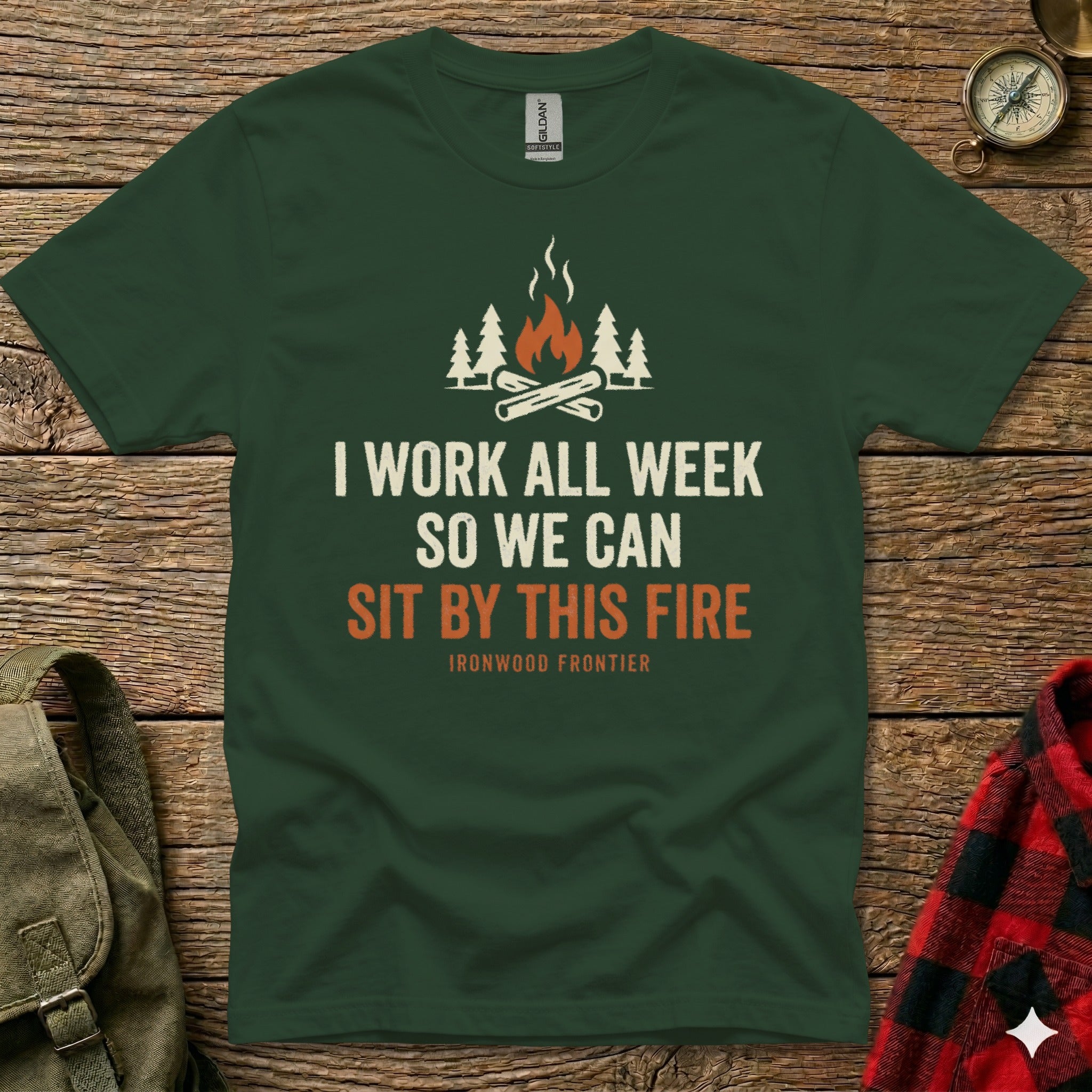 Green t-shirt with "I WORK ALL WEEK SO WE CAN SIT BY THIS FIRE" and "IRONWOOD FRONTIER" text.