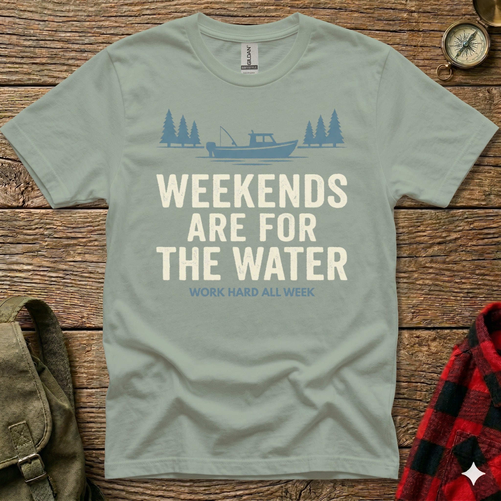 Light blue t-shirt with "Weekends are for the water. Work hard all week." text and boat graphic.