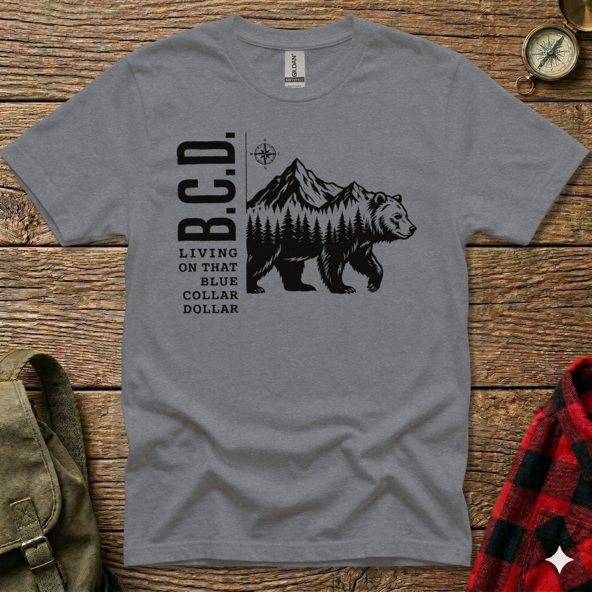 Gray t-shirt with B.C.D. text and bear in mountains graphic.